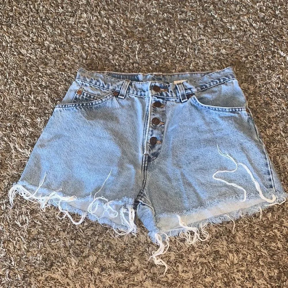Levi’s jean shorts, relaxed fit, size 9.